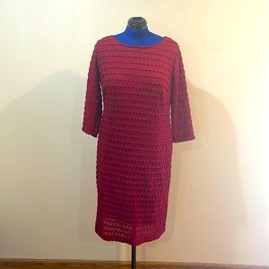 A red knee length dress